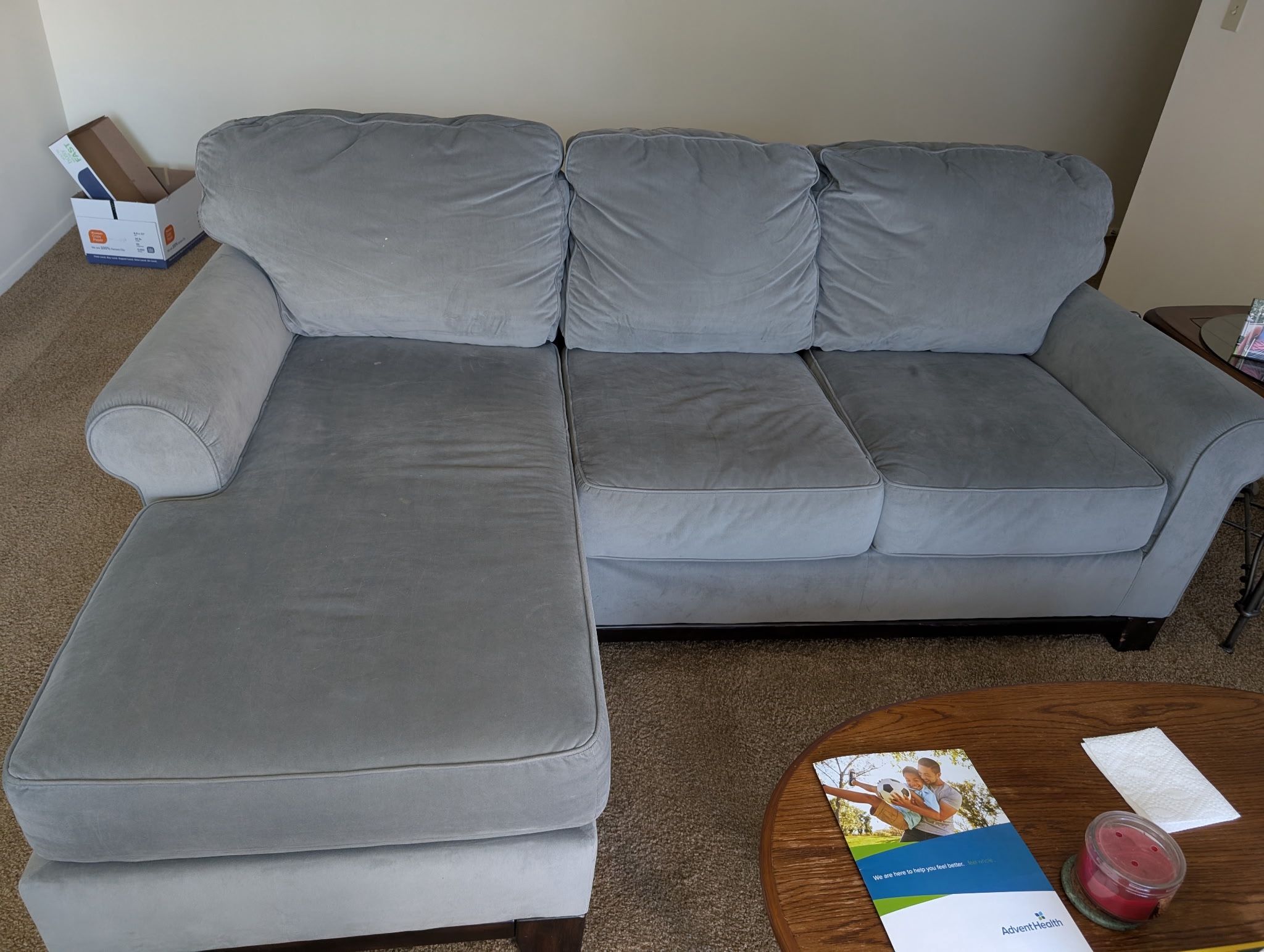 Light blue couch with ottoman