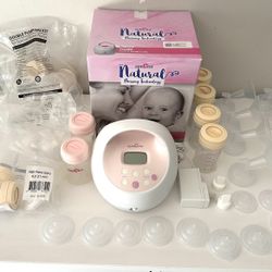 Spectra Breast Pump With New Extra Parts