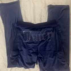 Juicy Couture velour tracksuit set, likely in the shade Regal Blue or Atlantis blue
