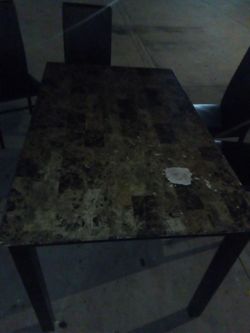 Dining Table complete with four chairs