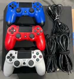 PS4 Pro Bundle  - 3 Controllers + 14 Games – $210 obo