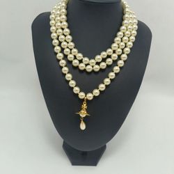 Brand-new three-layer pearl necklace with a golden yellow pendant