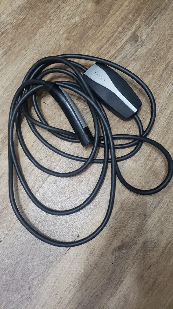 For Sale: **Portable Tesla Charging Cord** – Excellent Condition!