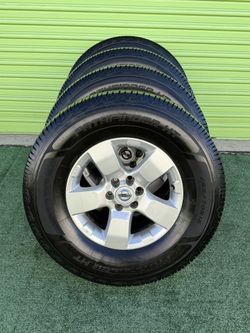 265/70/16 TIRES & NISSAN WHEELS