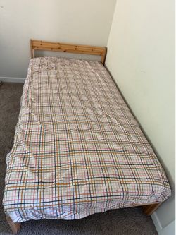 Twin beds with mattresses