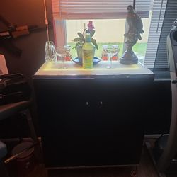 Lighted Bar With Lether Stools