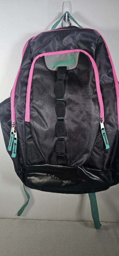 NWOT- AVIA Backpack. Color - Black, Blue and Pink accents.