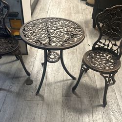 Brass three piece, kitchen or backyard set table and two chairs brand new in a box