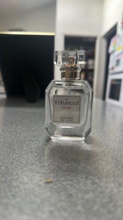 Enhanced allure pheromone perfume