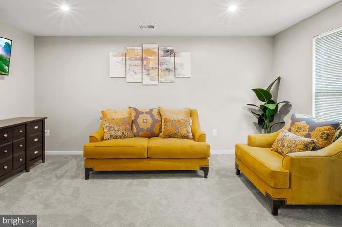 Brand New Couch and Chair With Accent Pillows.