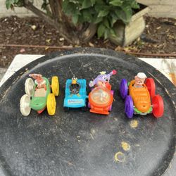 Vintage 1990s McDonald’s Looney Tunes & Tiny Toons Toy Lot (4) – Flipping Vehicles & Daffy Duck  ⸻  🧸 Description  Vintage McDonald’s Looney Tunes / 