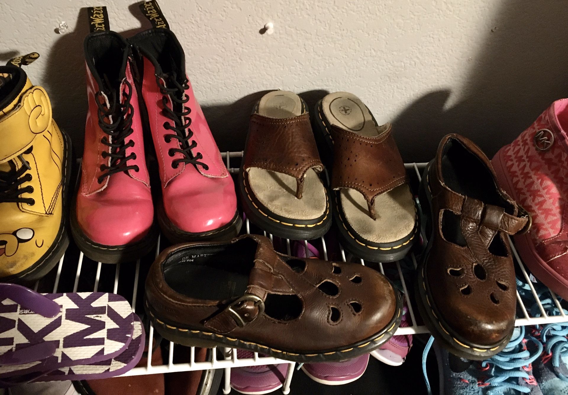 3 pairs of Dr. Martens size 1 , all three pairs $50! Pink side zip boot, slip on sandal , and strap sandal