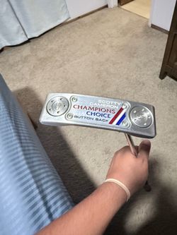 Scotty Cameron Newport + Champions Choice