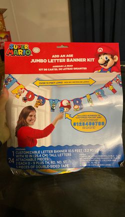 Super Mario birthday party banner and swirl decorations