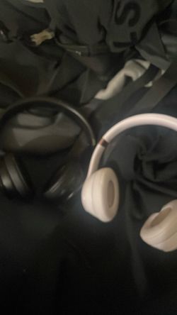 Two Over-Ear Headphones Black and pink Beats Studio 4s