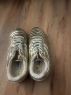 Girls gold shoes