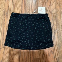 Comfy Black mini skirt with blue flower pattern size small