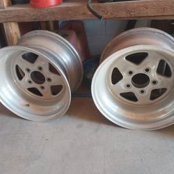 Two chevy wheels 15 × 8 " 