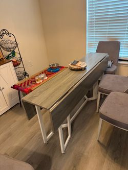 Foldable dining table set with 4 chairs