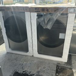 New In Box LG 4.5 Cu Ft Washer And 7.4 Cu Ft Gas Dryer 