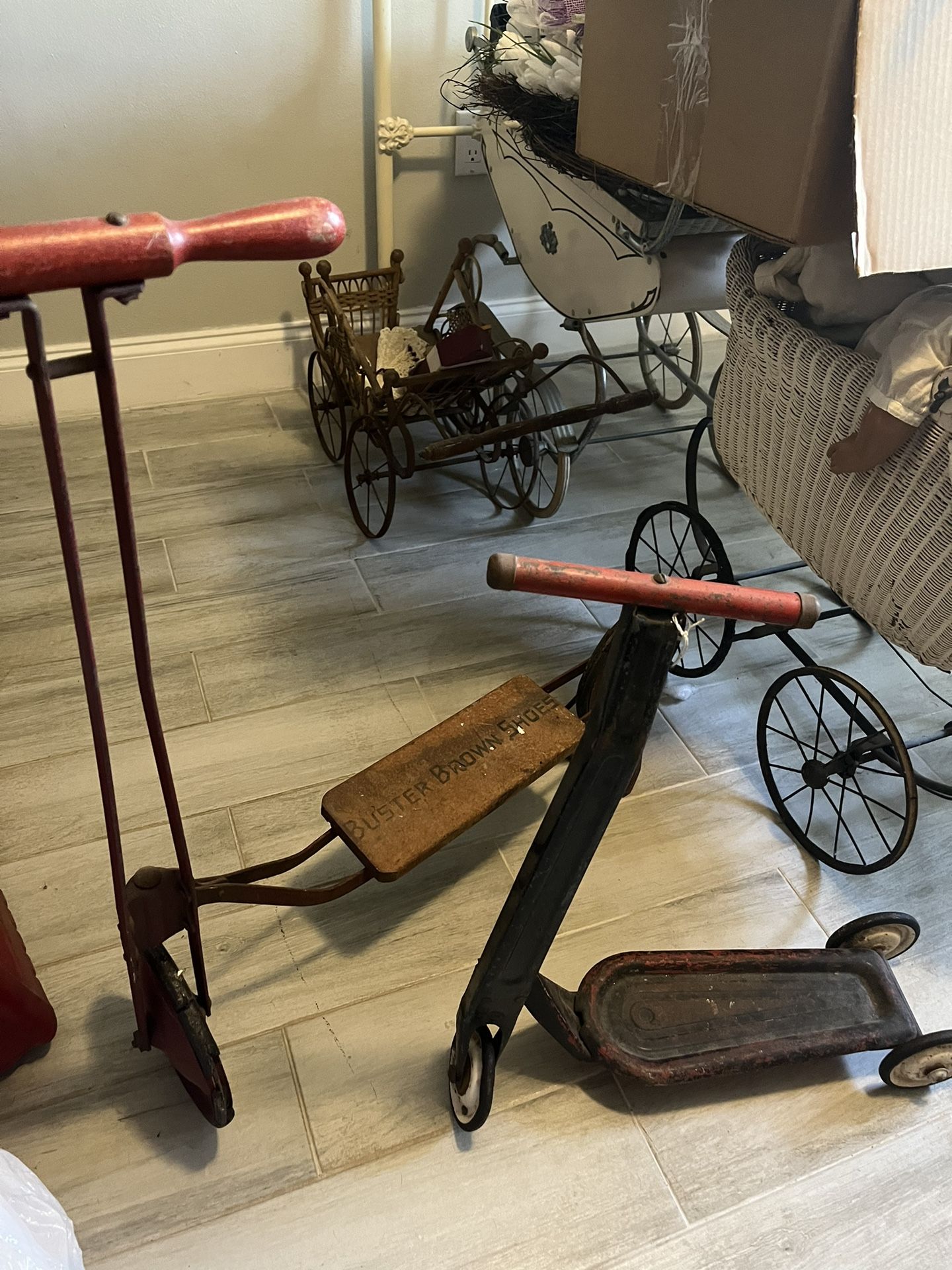 Two Antique Child’s Scooter Buster Brown