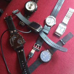 Six Stylish Men's Watches One Digital Smartwatch And 5 And Log Watches Includes Extra Batteries And A Charger For The Smartwatch