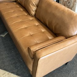 Brown Lifestyle Solution Faux Leather Sofa W/A Little Wear On One Pillow(See & Click On Pictures). Still In Very Good Condition 