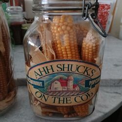 AHH   SHUCKS CORN ON THE COB