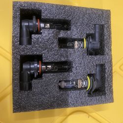 Toyota sienna 2 headlights Cases and 4 halogen light bulbs. 2004-2007.