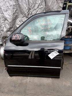 2001 - 2007 Toyota Sequoia Front door Driver Side Black Color Tag# 9770