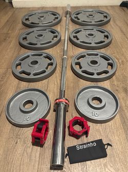 IVANKO’s  Olympic Weight Plates  (45s, 35s, 25s & 10s) In New Condition; Plus Titan 6ft Bar. Total: 270 lbs.