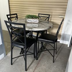 Brand New Table And 4 Chairs
