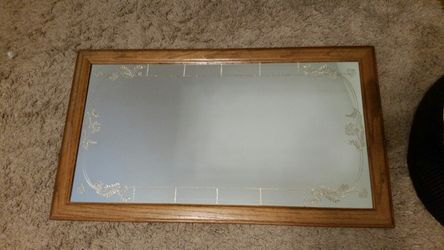 Mirror with wood frame
