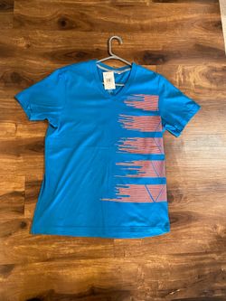 Brand new Mens Guess brand blue V Neck shirt up for sale