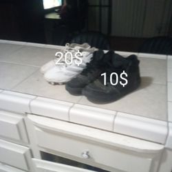 Black Nikes And Adzero Football Cleats 