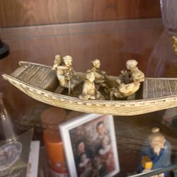 Small artwork/canoe with passenger/Asian