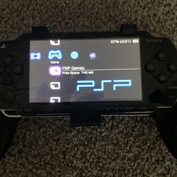 PSP 1000 (with games)