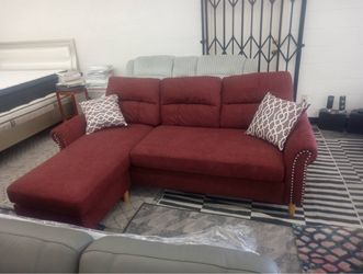 New burgundy reversible sectional couch