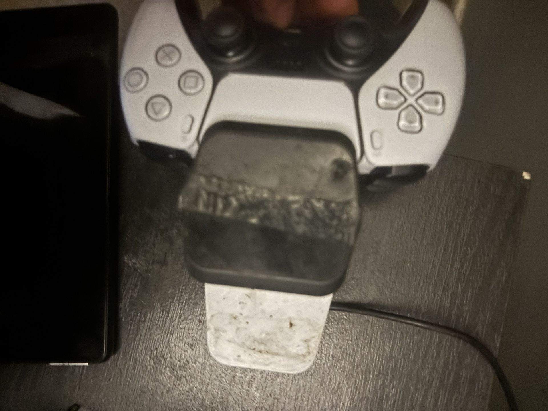 PS5 Controller with charging dock and gaming headphones