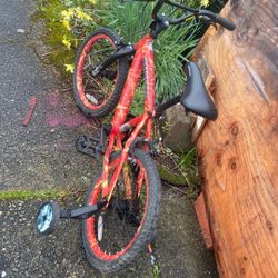 Bicycle W/ Training Wheel Price 20$. Pick Up E. 72. and.  Grandview.  E.  Tacoma 