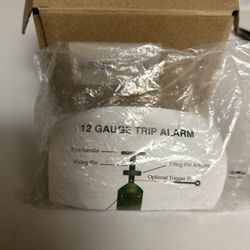 12 GAUGE TRIP ALARM NEW IN BOX
