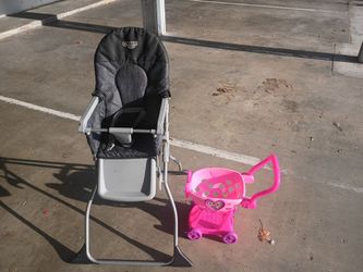 COSCO BRAND BABY HIGH CHAIR (FREE PINK CART THROWN IN)