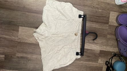 Off white button shorts. Size: L