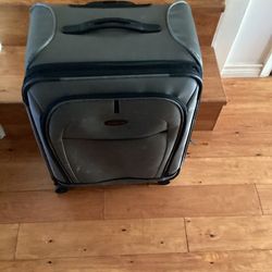 Samsonite  Luggage./ Suitcase(.Grey) Dimensions are;  17-1/2”W— 10”D — 24”H.