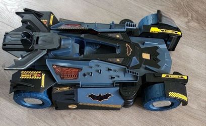DC Comics Batman Ultimate Transforming Batmobile  
Makes Sounds and lights up