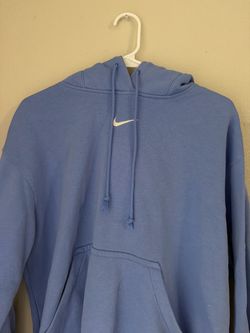 Blue Nike hoodie with white swoosh