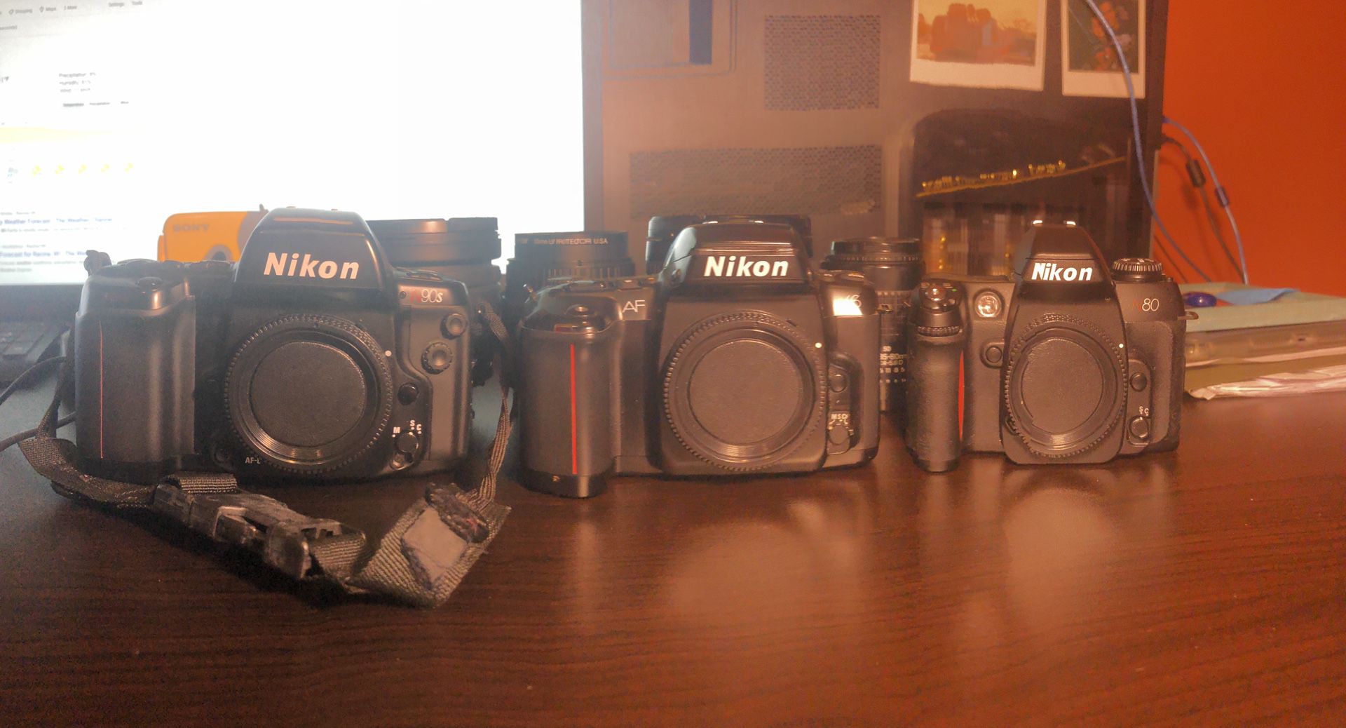 3 Nikon film cameras 4 lenses