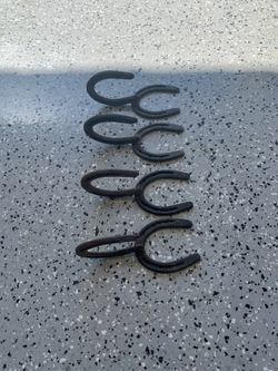 Horseshoe towel holders