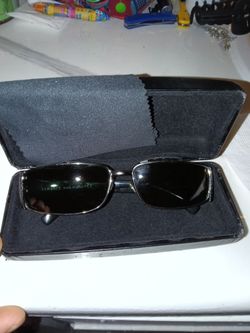 Versace sunglasses with case.