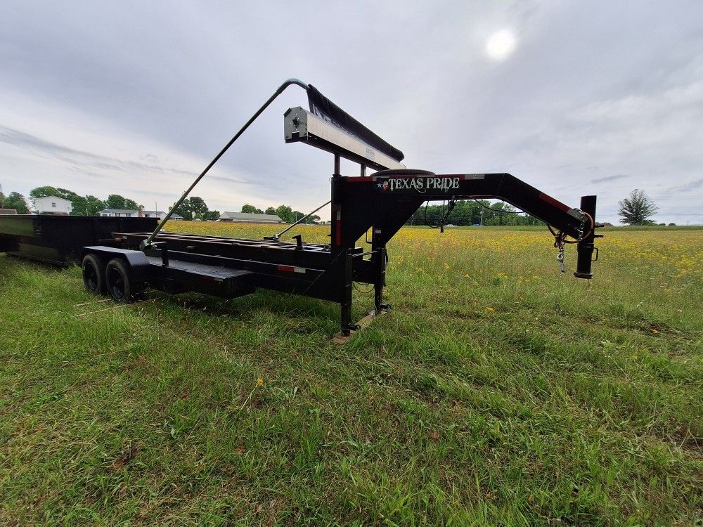 Roll-off Dumpster Trailer And Dumpsters